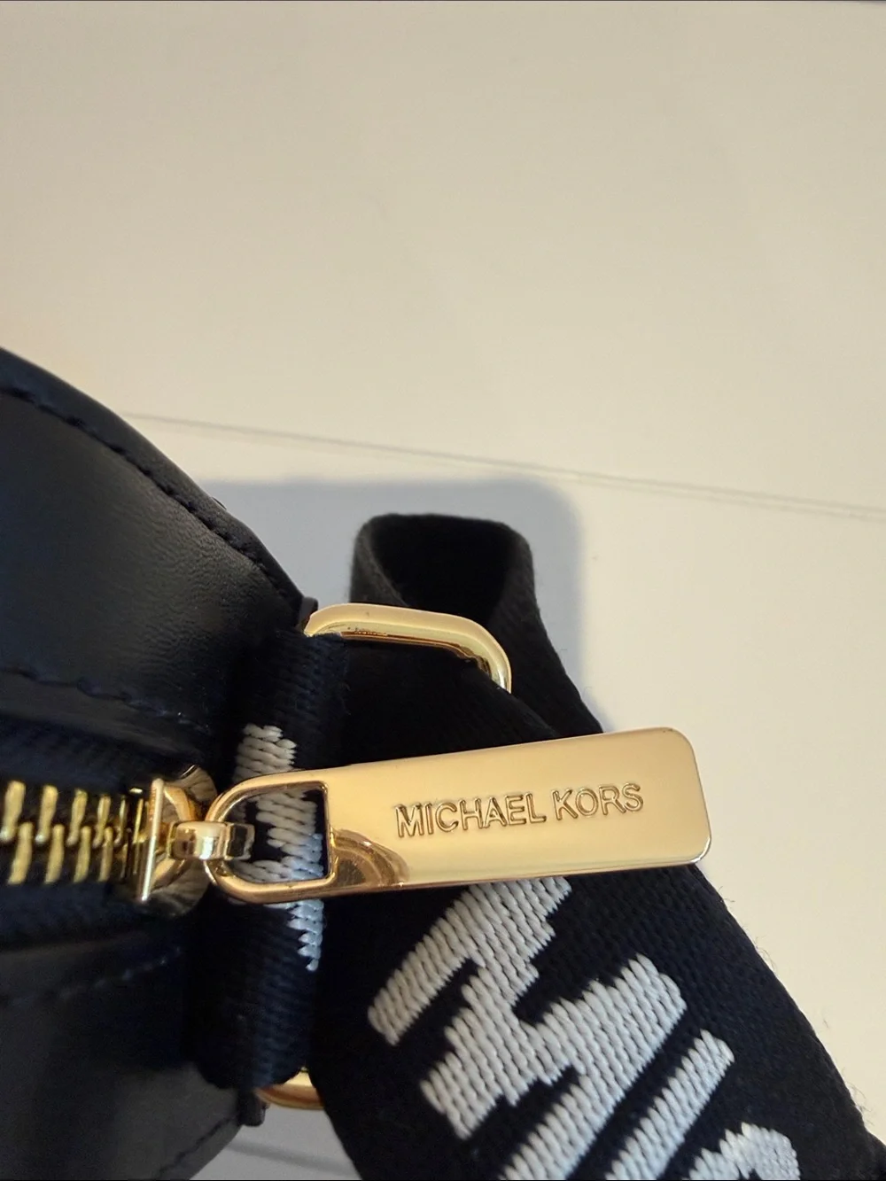 Michael Kors Black Pebbled Leather Crossbody with Logo Strap
